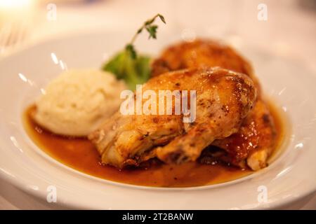 Cornish Game Hen with Thyme and Potatoes Stock Photo