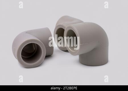 Polypropylene couplings for welding pipes on white. Stock Photo