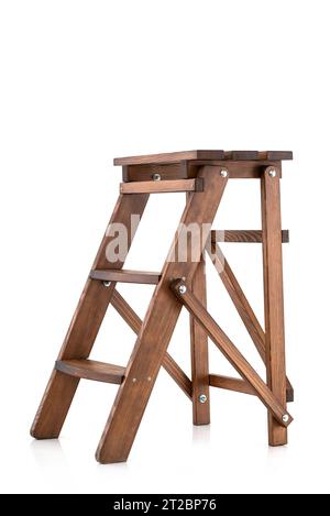 Small old-style decorative folding wooden ladder isolated on white background. wooden stairs Stock Photo