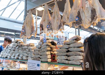 Dried salted cod fish on display at a market stall in Porto, Portugal Stock Photo