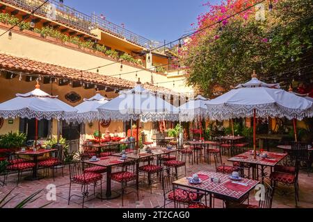 Patio restaurant inside the Hacienda El Santuario San Miguel de Allende hotel on Aldama Street in the historic city center of San Miguel de Allende, Mexico. Stock Photo