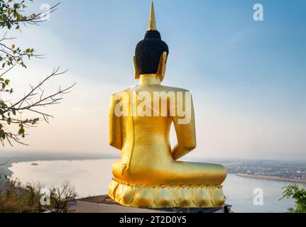 Famous hilltop landmark,a beautiful, vibrant gold image of the Buddhist icon,reflecting light from the setting sun,popular holy site and tourist attra Stock Photo