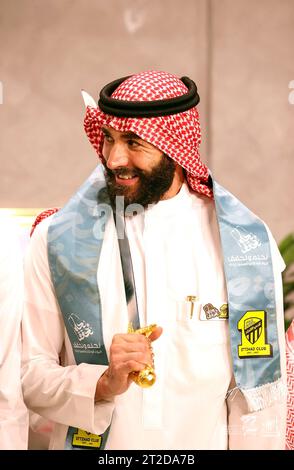 File photo - French football player Karim Benzema is seen dancing the traditional ‘aardha’, sometimes also known as the sword dance’, as he celebrates with his club ‘Al-Ittihad’, the Saudi National Day (September 23), in Jeddah, Kingdom of Saudi Arabia, on September 27, 2023. Benzema is wearing traditional Saudi clothes : a ghutra or keffieh on his head, a white dishdasha or thobe. 2022 Ballon d’Or winner Karim Benzema finds himself mired in political controversy amid the ongoing Israel-Hamas war. Speaking to French outlet CNews on Monday, French Interior Minister Gérald Darmanin accused Benze Stock Photo