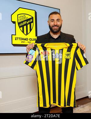 File photo - French football player Karim Benzema poses with club jersey after a signature ceremony in Madrid, Spain, on June 6, 2023. Al-Ittihad club announced a 3-year deal with Benzema, who is the second major football player to join a Saudi club after Cristiano Ronaldo. 2022 Ballon d’Or winner Karim Benzema finds himself mired in political controversy amid the ongoing Israel-Hamas war. Speaking to French outlet CNews on Monday, French Interior Minister Gérald Darmanin accused Benzema of having connections to the Muslim Brotherhood, a religious and political group which France considers a t Stock Photo