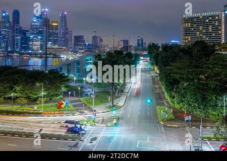 A night view of Singapore and Raffles Avenue at its intersection with Bayfront Avenue and Temasek Avenue, seen from the Benjamin Sheares Bridge. Stock Photo