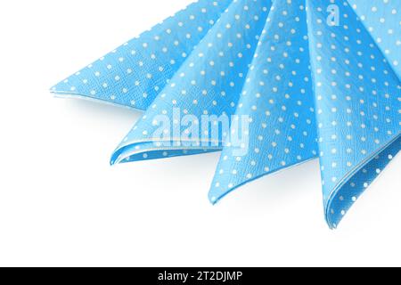 Stack of blue dotted paper napkins isolated on white Stock Photo