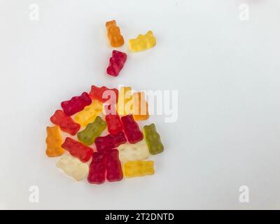 sweet dessert. gummy bears in the shape of a Christmas ball. red, yellow, green ball for the New Year's table. edible christmas eve decoration. Stock Photo