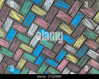 The texture of the floor surface of paving slabs, painted with bright multi-colored cheerful children's crayons. The background. Stock Photo