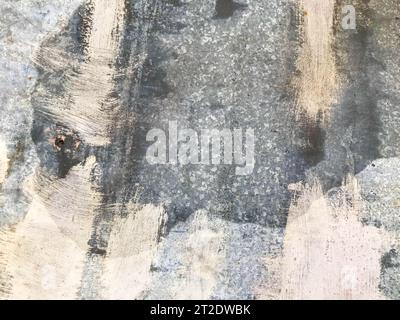 brush strokes on background. texture, paint beige on a silver substrate. creative drawing. creating a background picture. metallic background color, b Stock Photo
