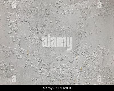 texture, silver colored metal sheet. metal is heterogeneous, porous, interspersed with paint. the metal sheet is colored non-uniformly, the paint fall Stock Photo