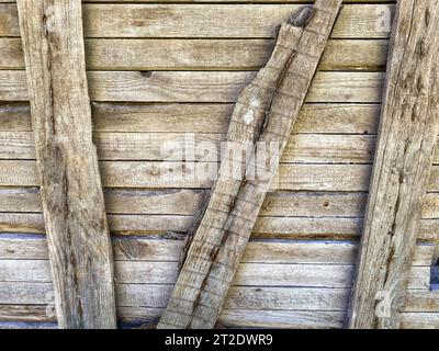 Brown wood texture of natural wood made from diagonal planks with knots. The background. Stock Photo