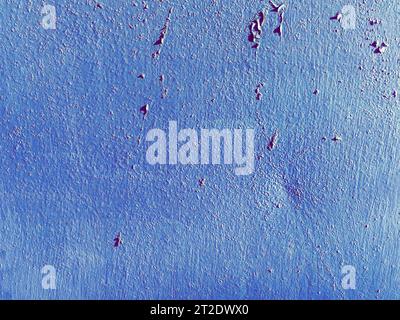 blue texture, a piece of metal glitters in the sun. metal sheet of dark blue color with spots of black, hardened resin. background with metal, smooth Stock Photo