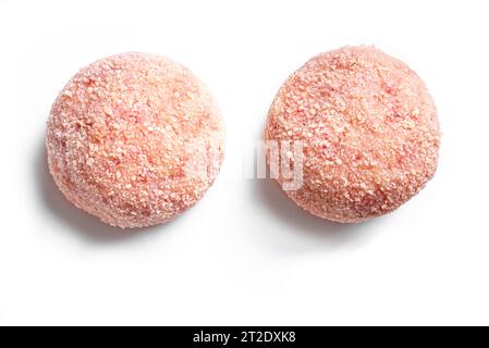 Raw cutlets or meatballs isolated on white background, close up. Chicken meat cutlet. Stock Photo