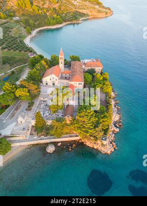 Aerial drone shot of the Dominican Monastery in Bol, Brač Island in Croatia Stock Photo