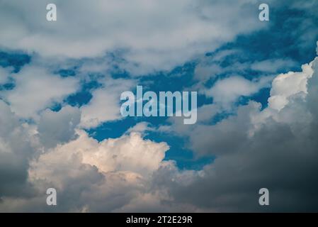 Photograph of prominent clouds in a blue sky in sunlight, taken with a polarizing filter Stock Photo