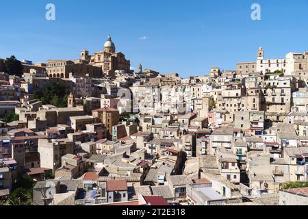 View of Piazza Armerina, a town in Enna province, Sicily, Italy. The Maria Santissima delle Vittorie Cathedral is shown on top. Stock Photo