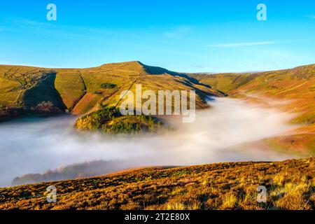 A mist filled Grindsbrook on Kinder Scout in the Peak District National Park Stock Photo