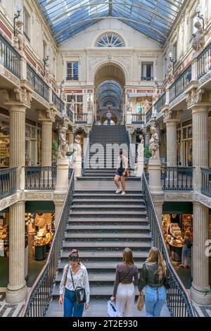 Passage Pommeraye is a covered passage in Nantes, France. Developer, Louis Pommeraye built 3 floors linked with a grand staircase. Completed in 1843. Stock Photo