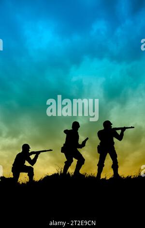 patrol of soldiers on a ridge, silhouettes Stock Photo