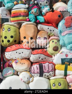 Closeup of colourful Studio Ghibli children's soft toys in the Animetal shop window on Endell Street in London's West End Stock Photo