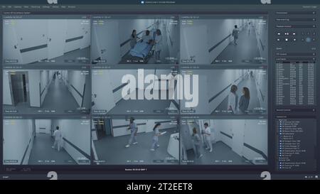 Playback CCTV cameras in hospital hallway on computer or tablet screen. User interface of monitoring program and people AI recognition system. Security cameras. Concept of surveillance and tracking. Stock Photo