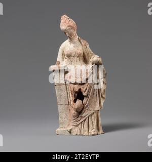 Terracotta statuette of a woman leaning on a pillar Greek, South Italian, Tarentine 3rd century BCE Draped, leaning right arm on pedestal. View more. Terracotta statuette of a woman leaning on a pillar. Greek, South Italian, Tarentine. 3rd century BCE. Terracotta. Hellenistic. Terracottas Stock Photo