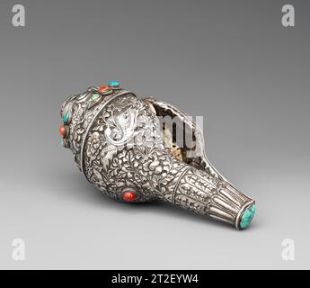 Ritual Conch Shell Trumpet (Dung-Dkar) Tibet 19th Century View more. Ritual Conch Shell Trumpet (Dung-Dkar). Tibet. 19th Century. Conch shell, silver, turquoise and coral. Musical instruments Stock Photo