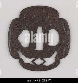 Sword Guard (Tsuba) Japanese late 16th–early 17th century A tsuba is a sword guard and part of a sword mounting. It is mounted between the sword’s blade and grip to protect the user’s hands. Stock Photo