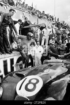 The Jaguar C-Type of Tony Rolt and Duncan Hamilton racing to victory in ...