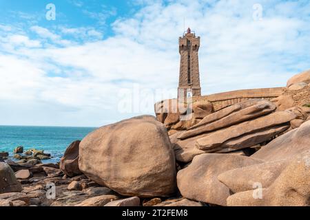 Lighthouse Mean Ruz is a building built in pink granite, port of Ploumanach, in the town of Perros-Guirec in the department of Cotes-d'Armor, in Stock Photo