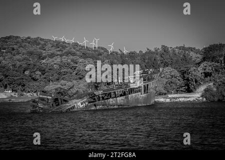 Abandoned ship in the port of Roatan, black and white photo. Honduras Stock Photo