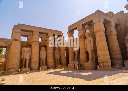 The sculptures of pharaohs and ancient Egyptian drawings on the columns of the Luxor Temple. Egypt Stock Photo