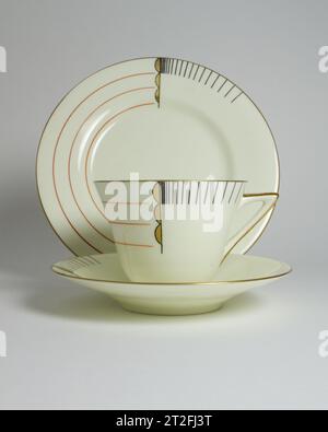 Antique Art Deco Royal Doulton Magna pattern porcelain trio, consisting of a cup, saucer and plate, decorated with a stylish Modernist design. Stock Photo