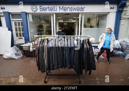 The clean up gets underway on Main street in Midleton, Co Cork, after extensive damage caused by flooding following Storm Babet, the second named storm of the season, swept in. Picture date: Thursday October 19, 2023. Stock Photo