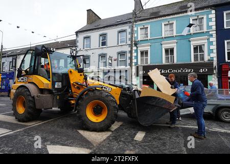 The clean up gets underway on Main street in Midleton, Co Cork, after extensive damage caused by flooding following Storm Babet, the second named storm of the season, swept in. Picture date: Thursday October 19, 2023. Stock Photo