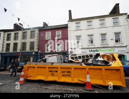 The clean up gets underway on Main street in Midleton, Co Cork, after extensive damage caused by flooding following Storm Babet, the second named storm of the season, swept in. Picture date: Thursday October 19, 2023. Stock Photo