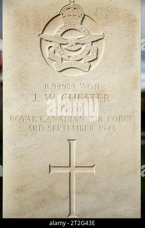 Gravestone of RCAF Warrant Officer J W Chester, killed in World War Two, at St Patrick's Church, Jurby, Isle of Man. Stock Photo