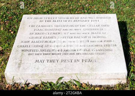 Memorial stone outside Portsmouth Cathedral commemorating people killed at 101 High Street in the blitz, bombed 10 January 1941, Hampshire England UK Stock Photo