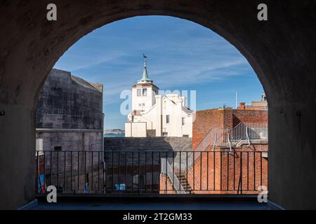 View through an arch of the Round Tower, part of the Tudor fortifications of Old Portsmouth city, Hampshire, England, UK Stock Photo