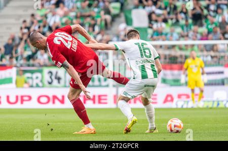 BUDAPEST, HUNGARY - MAY 11: Kristoffer Zachariassen of Ferencvarosi TC runs  with the ball during the Hungarian Cup Final match between Ferencvarosi TC  and Paksi FC at Puskas Arena on May 11