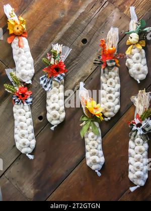 Decorated Garlic Braids on Display Stock Photo
