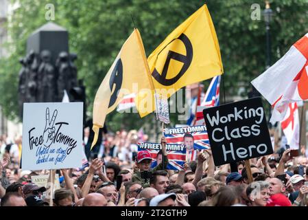 Supporters of Tommy Robinson such as the EDL, protested in London demonstrating for his release after arrest. Identitarian movement lambda symbol flag Stock Photo