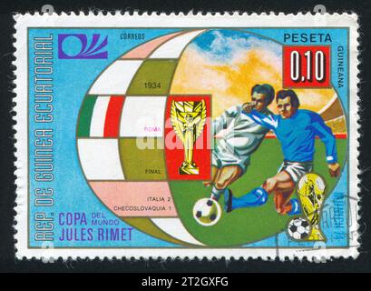 EQUATORIAL GUINEA - CIRCA 1974:  stamp printed by Equatorial Guinea, shows soccer, circa 1974. Stock Photo