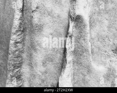 ancient texture. a gray stone, a piece of a statue. volumetric texture of stone and sand. texture from the museum, marble wall. 3d background. Stock Photo