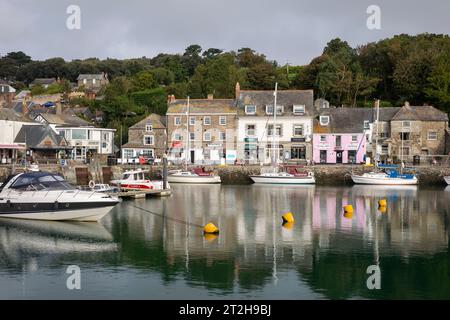 Padstow harbour and reflection of surrounding buildings, boats and yachts Moore din the harbour,Cornwall, England,UK,2023 Stock Photo