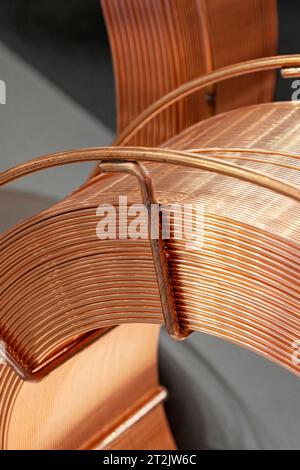 Coils of copper-plated wire for welding work, industrial abstract background Stock Photo
