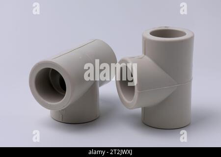 Polypropylene couplings for welding pipes on white. Stock Photo