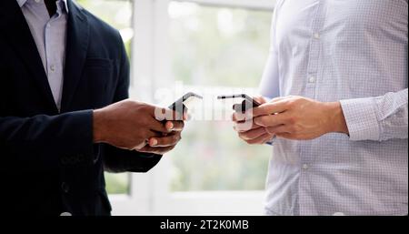 African Hand Holding Mobile Phone Or Cellphone Stock Photo