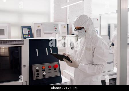 Pharmaceutical Industry Manufacturing Factory. Medical Engineer Using Technology Stock Photo