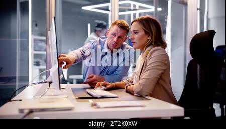 Analyst Working With Spreadsheet Business Data On Computer Stock Photo